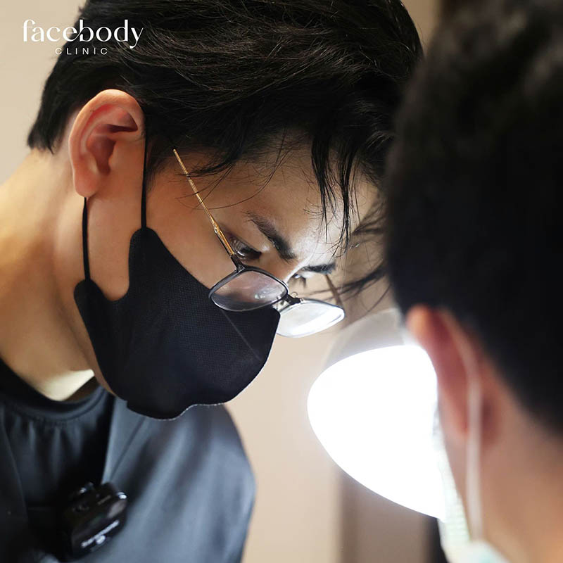 A board-certified physician examining a patient, showcasing the practical application of their expertise.